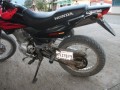 Guatemala: Andere Länder, andere Sitten: manche Motorräder haben das Kennzeichen seitlich an der Schwinge.